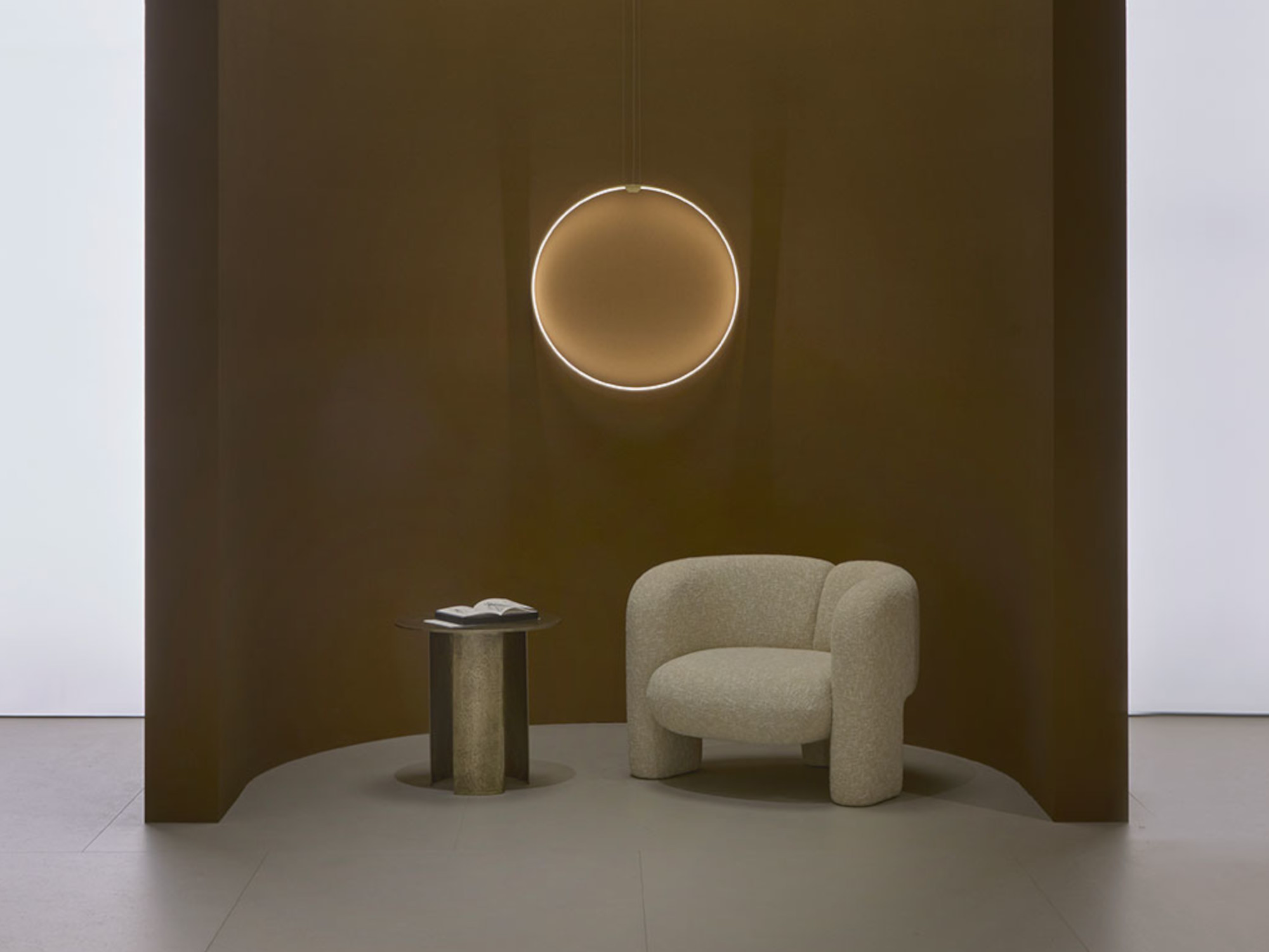 Armchair in fabric zero by Sahco boucle' Emma